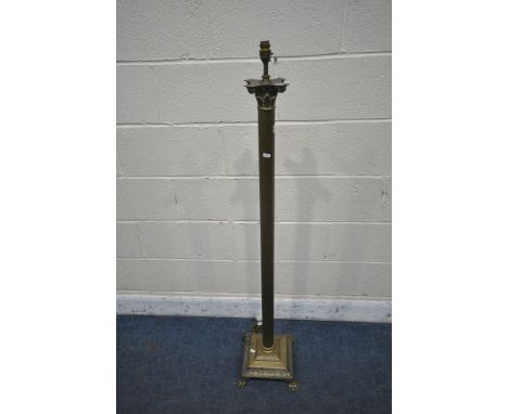 A BRASS CORINTHIAN COLUMN STANDARD LAMP, with a square base, on claw feet, height 137cm (condition report: general wear)