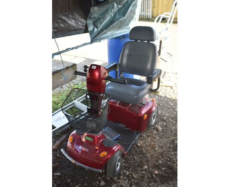 A MAYFAIR RED ELECTRIC MOBILITY SCOOTER (condition report: with charger cable and key)