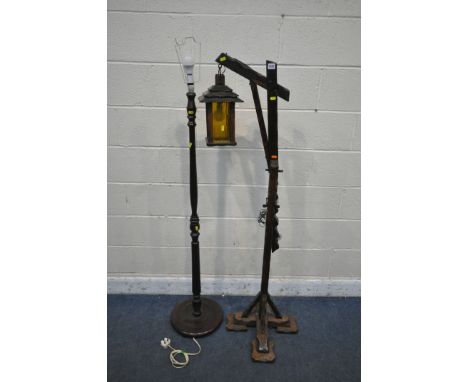 AN OAK ADJUSTABLE LANTERN STANDARD LAMP, and another standard lamp (condition report: lantern lamp appears to have been put t