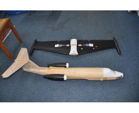 A GREAT PLANES LEARJET.40 MODEL PLANE partially built with plans, wiring in place but no engine or propeller wingspan 56in