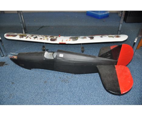 A FLAIR PATRIOT MODEL PLANE with 61in wingspan, and plan, appears to be complete but no engine or propeller
