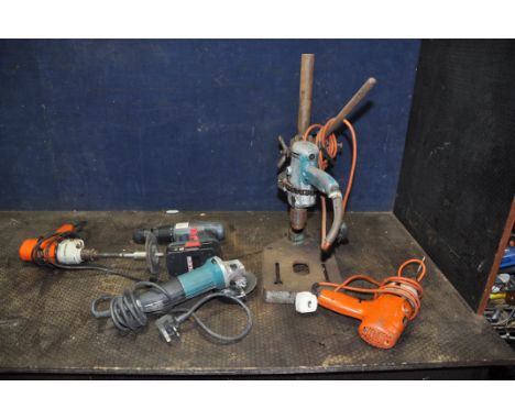 A SELECTION OF POWER TOOLS including a Makita GA4530 240v angle grinder (PAT pass and working) a Performance 24v drill with o