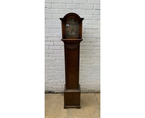 Oak longcase grandmother clock with brass face, pendulum, key and single weight. Not working. 64” high