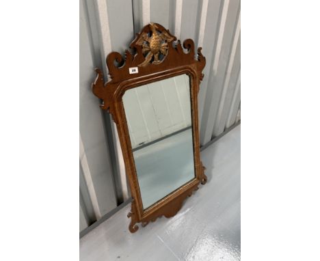Chippendale style mahogany wall mirror with gilt ho-ho bird. 38” high, 21” wide