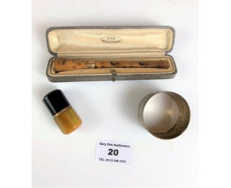 Boxed amber cigarette holder, miniature amber cigarette lighter and plated napkin ring