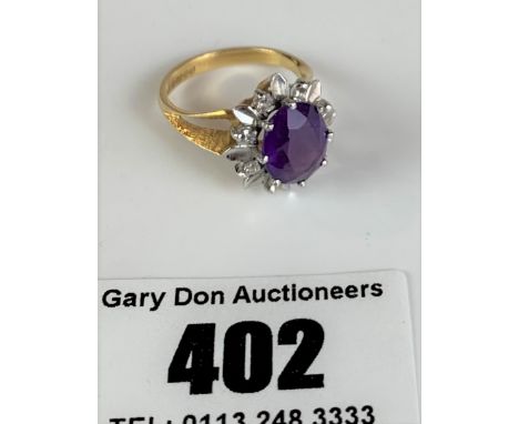 18k gold diamond and amethyst stone ring, size J, w: 4.4 gms