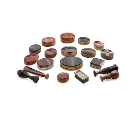 A COLLECTION OF VICTORIAN AND LATER HARDSTONE MOUNTED BOXES to include twelve banded agate set oval snuff boxes and another s
