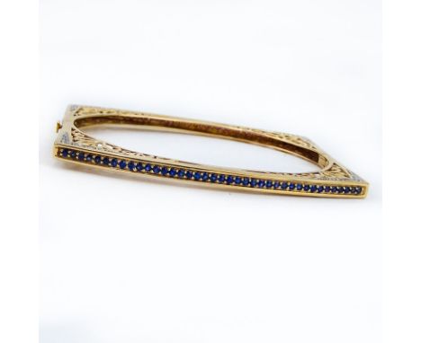 Fine 14 Karat Yellow Gold, Diamond, Round Cut Sapphire and Ruby Openwork Square Form Hinged Bangle Bracelet. Signed and stamp