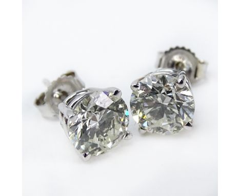 Approx. 2.0 Carat TW Round Brilliant Cut Diamond and 14 Karat White Gold Stud Earrings. J-K clarity, SI1 clarity. Stamped 14K