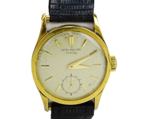 Vintage Patek Philippe 18 Karat Yellow Gold Manual Movement Watch with Leather Strap and 18 Karat Yellow Gold Buckle. Referen