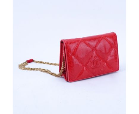 Chanel Red Lizard Multi-Chains Flap Bag. Red leather interior with zipper pocket. Original box and bag included. Authenticity