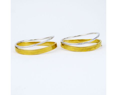Pair of Pave Set Diamond, 18 Karat White and Yellow Gold Hinged Bangle Bracelets. Each stamped 18k, Italy. Good condition. Me