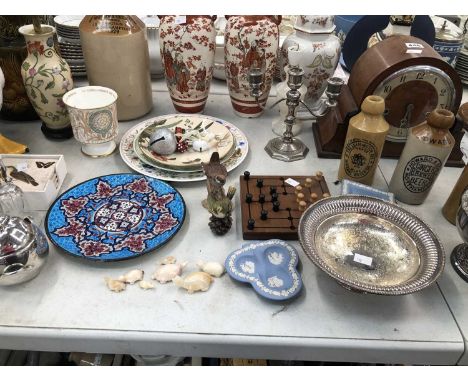 A pair of Kutani vases, three table lamps, stoneware flasks, decorative and other plates, a clock, electroplate, etc.