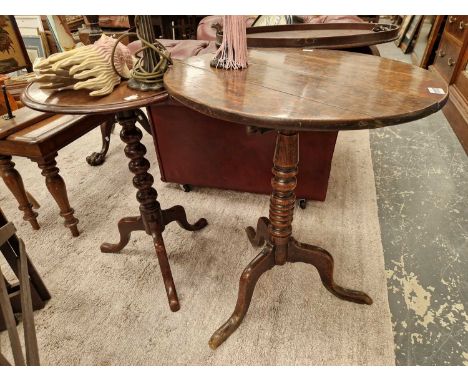 Two 19th century tripod wine tables.