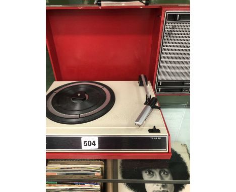 A red plastic cased Philips turntable with integral speaker