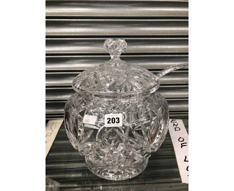 A clear glass punch bowl, cover and a ladle