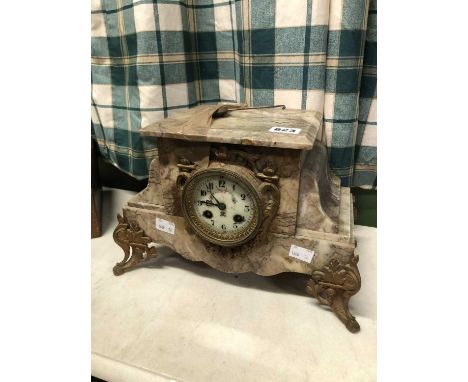 A Victorian marble mantle clock.