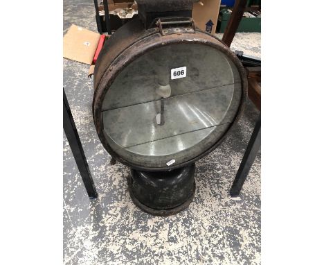 A very large Tilley search light.