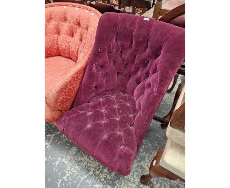 A late victorian button upholstered nursing chair.
