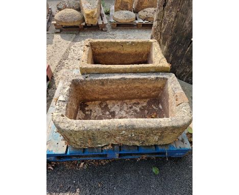 A 19th-century carved stone d-form garden trough and one other of rectangular form