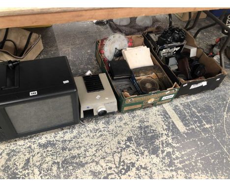 Cameras, tapes and taper recorders, a slide projector and a machine by Bauer