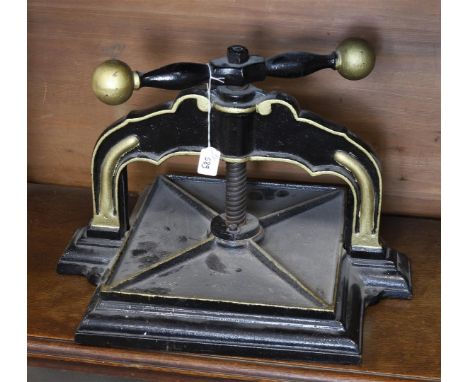 A cast iron book press with rotary mechanism, 19th century.
