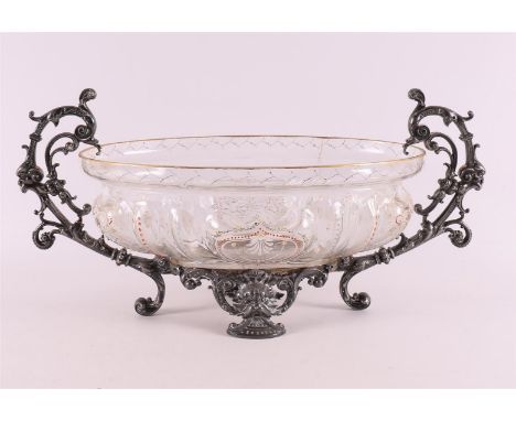 A glass fruit bowl in a pewter frame, 19th century. Polychrome enamel decor, h 21 x l 45 cm (glued glass bowl).