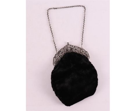 A 2nd grade 835/1000 silver purse bracket with black cloth bag.