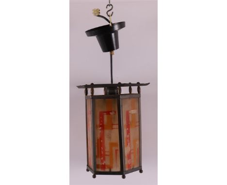 A hexagonal glass-in-copper Amsterdam School hall lamp with fringes, ca. 1920, h 24.5 cm (some decor wear).