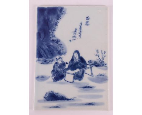 A blue and white porcelain rectangular tile, China, republic, 20th century. Blue underglaze decor of two figures at a table a