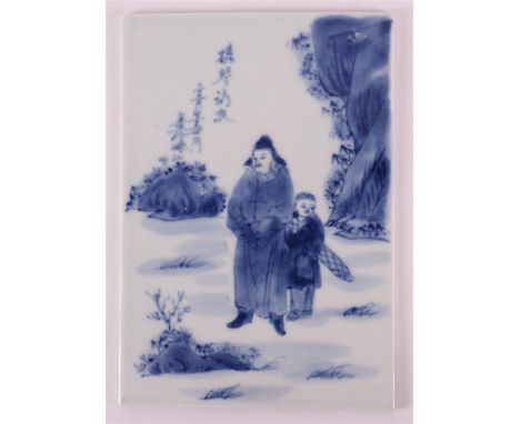 A blue and white porcelain rectangular tile, China, republic, 20th century. Blue underglaze decoration of two figures in land