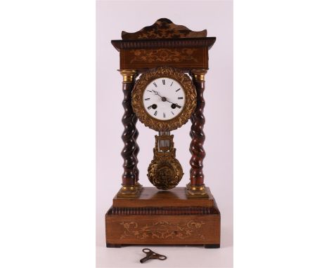 A walnut-glued column mantel clock, France, Napoleon Trois, ca. 1870. Capital and base with applications in floral motifs, wh