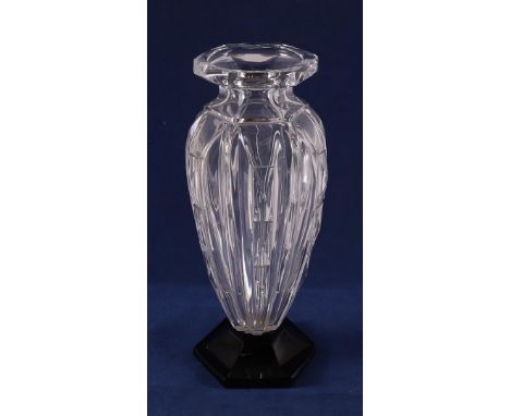 France, Nancy. A cut baluster-shaped clear crystal vase on a hexagonal black glass base, ca. 1930. Marked with etching mark: 