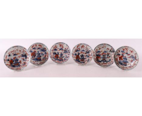 A set of six Chinese Imari saucers, China, Kangxi, early 18th century. Blue/red decor of a pagoda in a landscape, Ø 11 cm, to