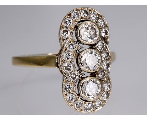 Ring mit 25 Brillanten, zusammen ca. 0,75 ct, Art Deco.585/- Gelb- und Weißgold. Gesamtgewicht ca. 4,1 g. Längliches Hochform