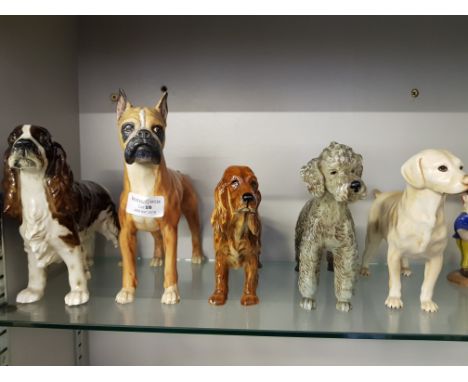 Five Goebel dog ornaments.
