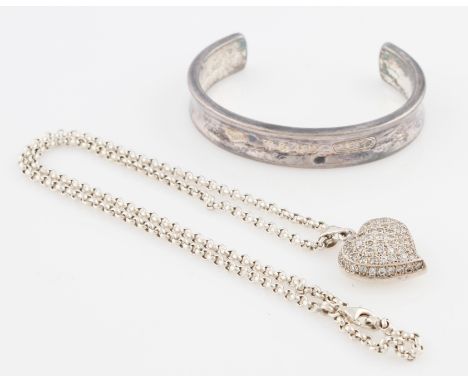 A Tiffany & Co. stone set heart pendant and chain, stamped 925, together with a Tiffany & Co. bangle, dated 1997 to interior 