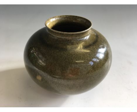 An Alan Spencer Green studio pottery green glazed vase. Signed to base. Height 11cm. Together with a black papier mache trave