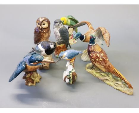 Six Beswick bird figures, three Beswick Bird of Prey Whisky figures, and two ceramic birds, marked John Beswick to base.