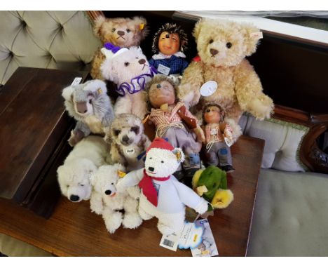 Twelve various Steiff soft toys, including teddy bears, hedgehog, duck, polar bear.