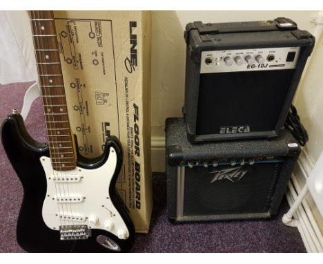 A Squires Strat electric guitar, Peavey amplifier, Line 6 floorboard etc.