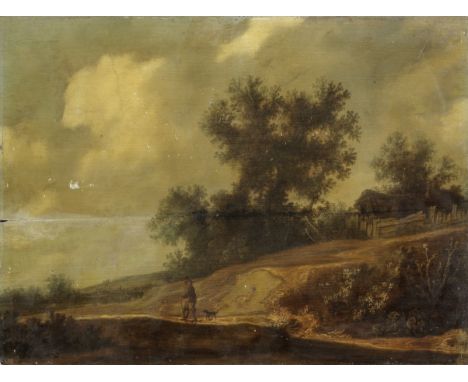 Circle of Pieter de Molijn (London 1595-1661 Haarlem)A wooded landscape with a traveller and his dog on a path oil on panel37