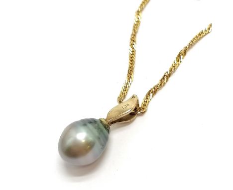 9ct marked gold pearl pendant on a 9ct hallmarked gold 38cm chain - total weight 3.4g - SOLD ON BEHALF OF THE NEW BREAST CANC