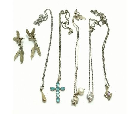 5 silver marked pendants on silver chains incl. amethyst, blue topaz cross a Louise walrond pearl set T/W pair of silver mark