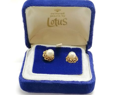 Pair of 9ct hallmarked gold lotus pearl stud earrings in original box - 2.6g total weight