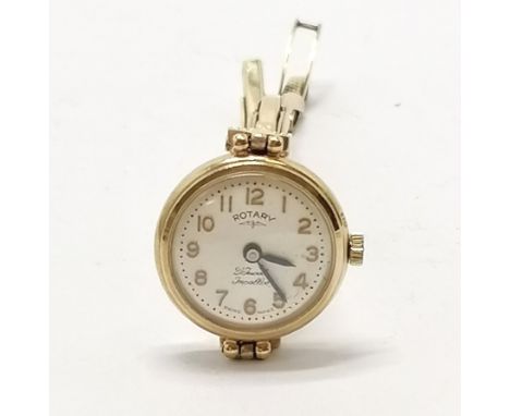 9ct gold ladies Rotary manual wind wristwatch on a sprung (slightly stretched) 9ct gold bracelet - total weight 15g &amp; run