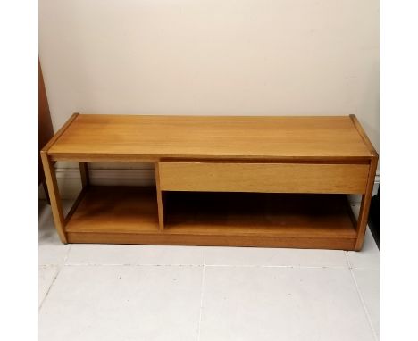 Mid 20thc teak long coffee table with drawer and shelf 134cm long x 44cm deep x 49cm high- in good used condition 