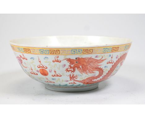  Large bowl with dragon and phoenix 19th cent. Very fine painting with sculptural relief enamelling and iron red and enamel g