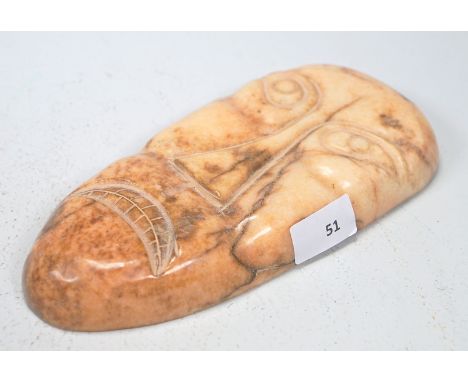 Mask Cream-coloured jadeite, nephrite with reddish and greyish tints, massive, approx. 24cm long, Z1-2.Provenance: Peitscher 
