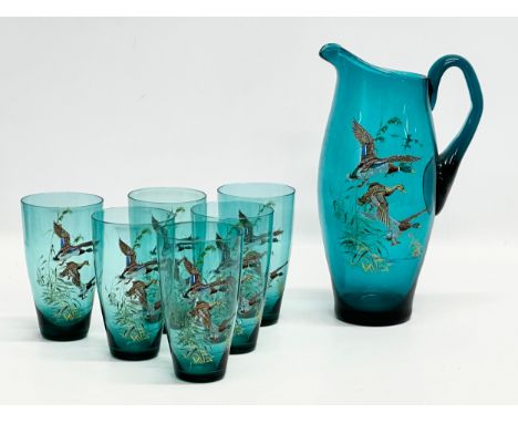 A 1960’s Bohemian glass drinks set. Pitcher 25cm. 6 glasses 12cm